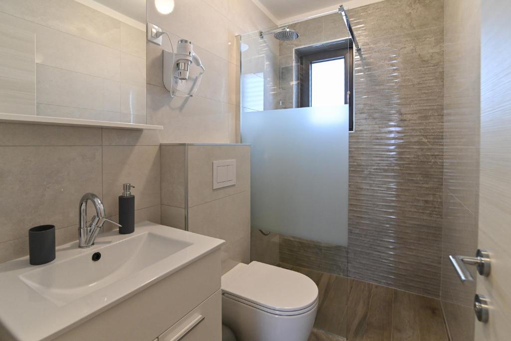 Koupelna v ubytování Rooms & Apartments Jadranka