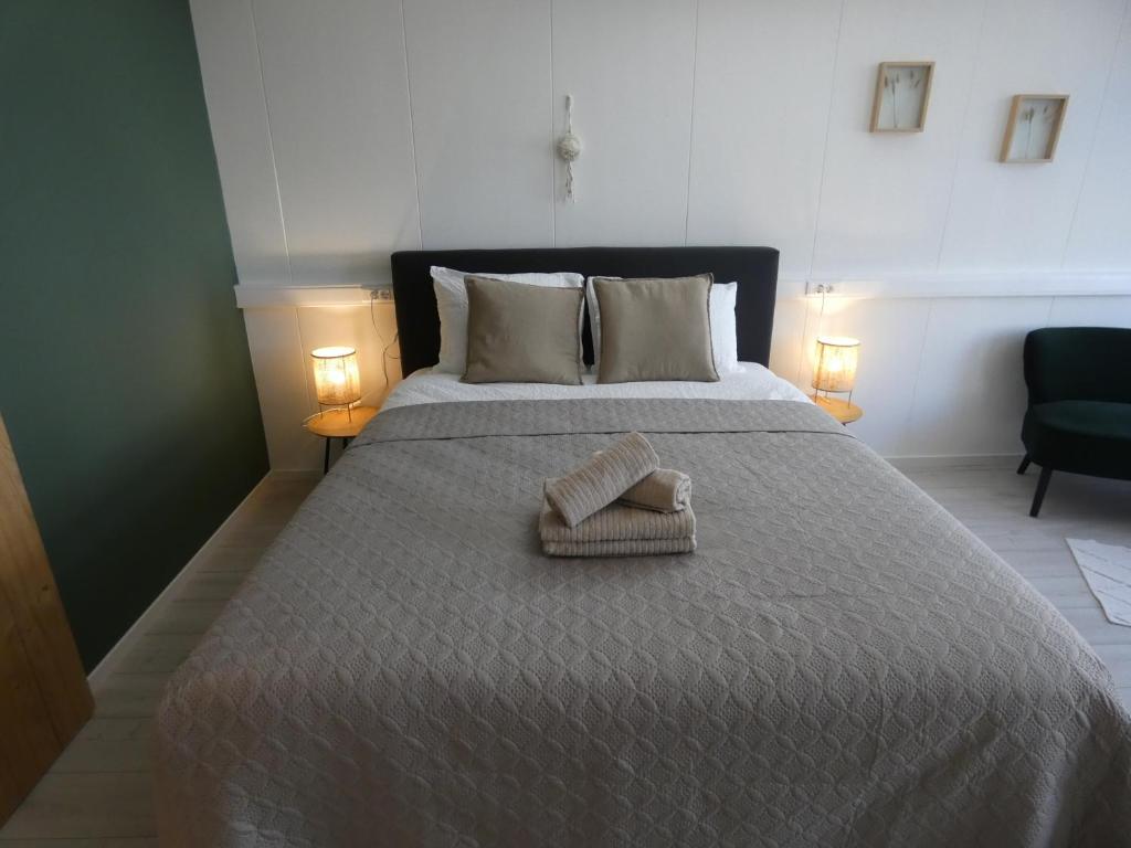 Postel nebo postele na pokoji v ubytování B&B Badhuis