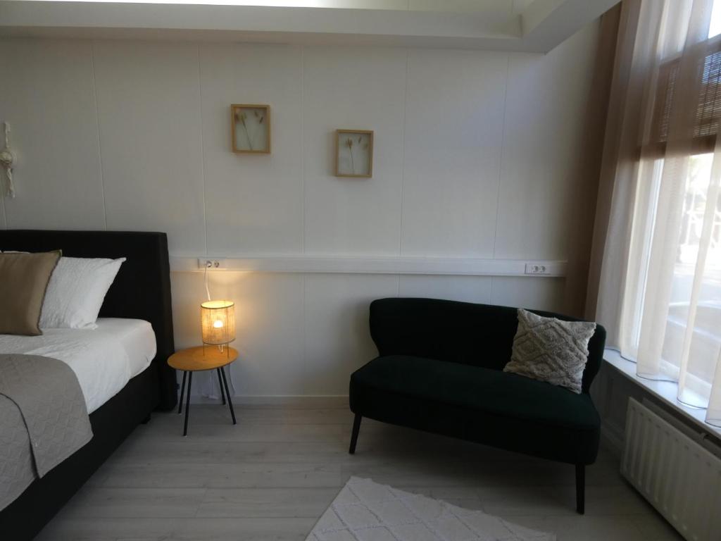 Posezení v ubytování B&B Badhuis
