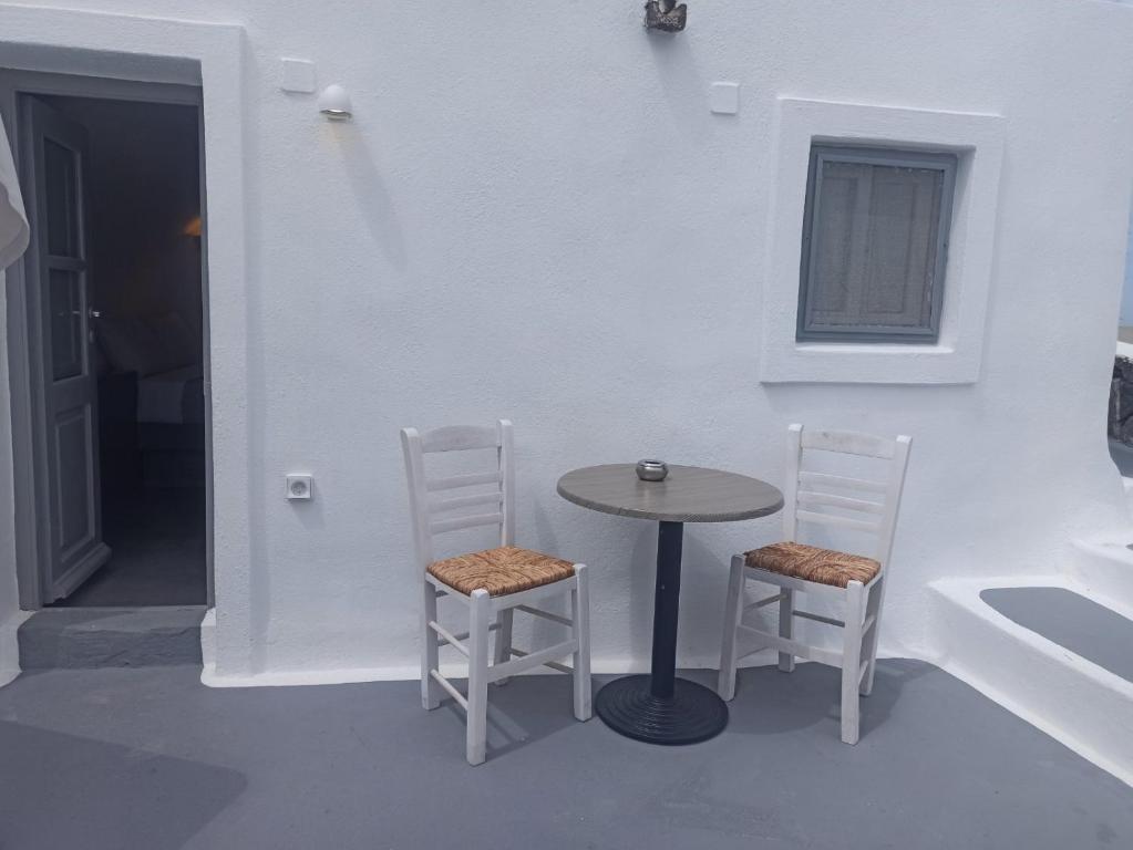 Fotografie z fotogalerie ubytování AQUA SERENITY LUXURY SUITES SANTORINI v destinaci Foinikiá