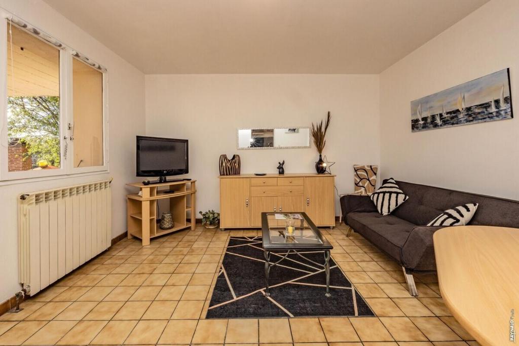 Ruang duduk di Appartement la Toscanelle - Quartier historique - Gaillac