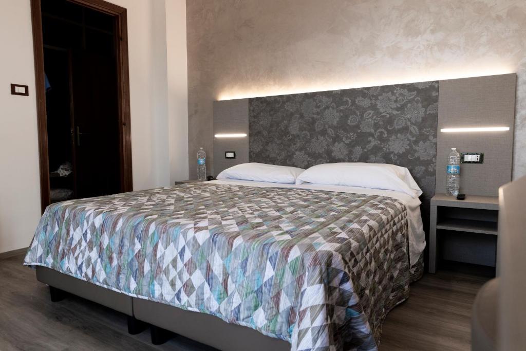 Postel nebo postele na pokoji v ubytování Hotel Casa Tra Noi