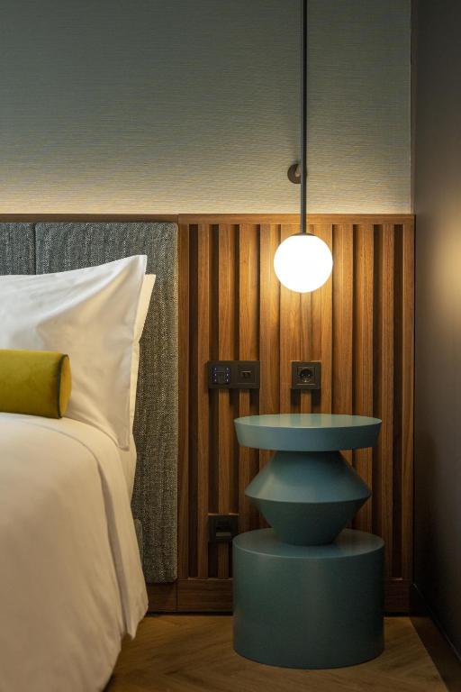 Postel nebo postele na pokoji v ubytování Renaissance Porto Lapa Hotel