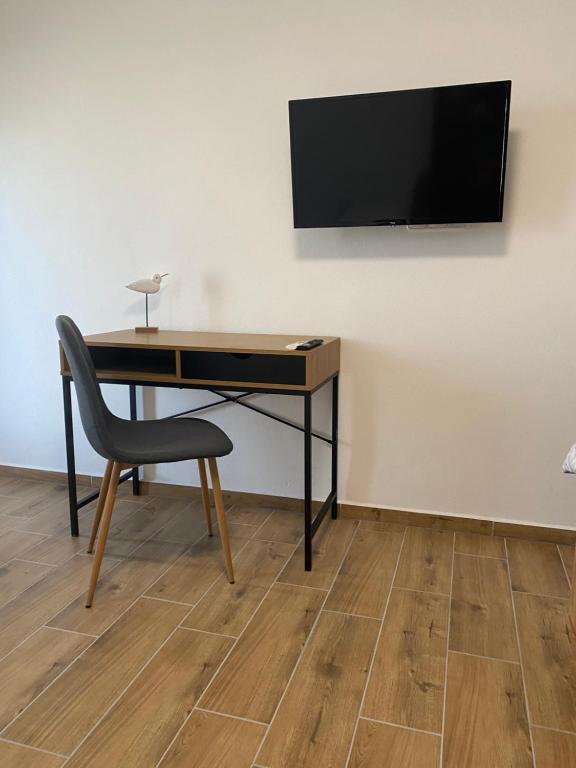 A television and/or entertainment centre at R-Penzion