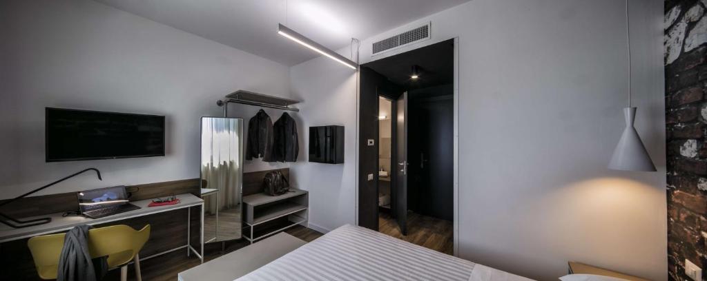 TV a/nebo společenská místnost v ubytování Best Western Hotel Corsi