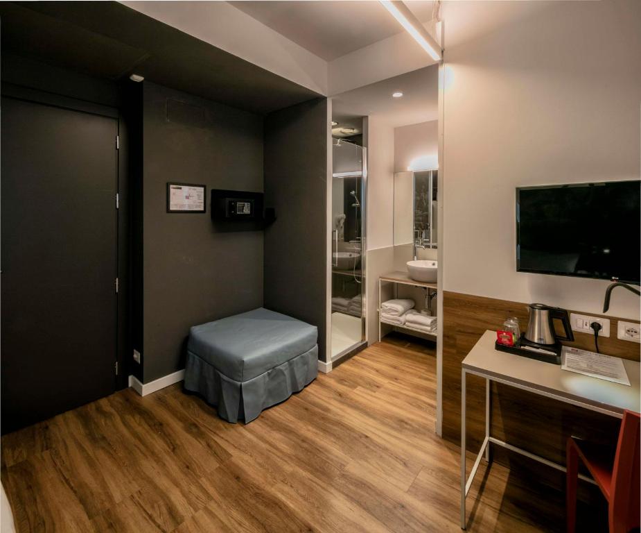 TV a/nebo společenská místnost v ubytování Best Western Hotel Corsi