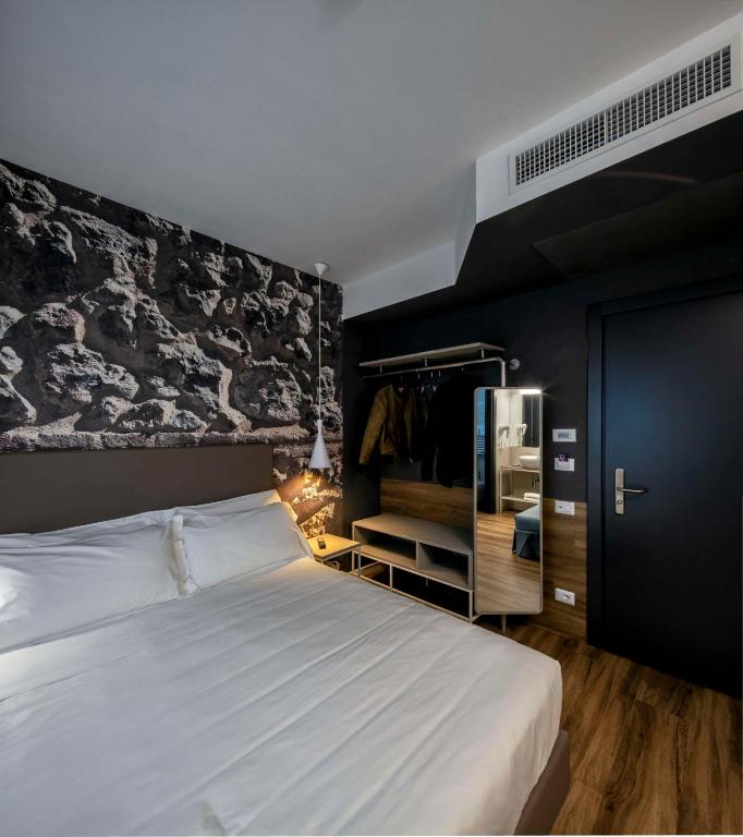 Postel nebo postele na pokoji v ubytování Best Western Hotel Corsi