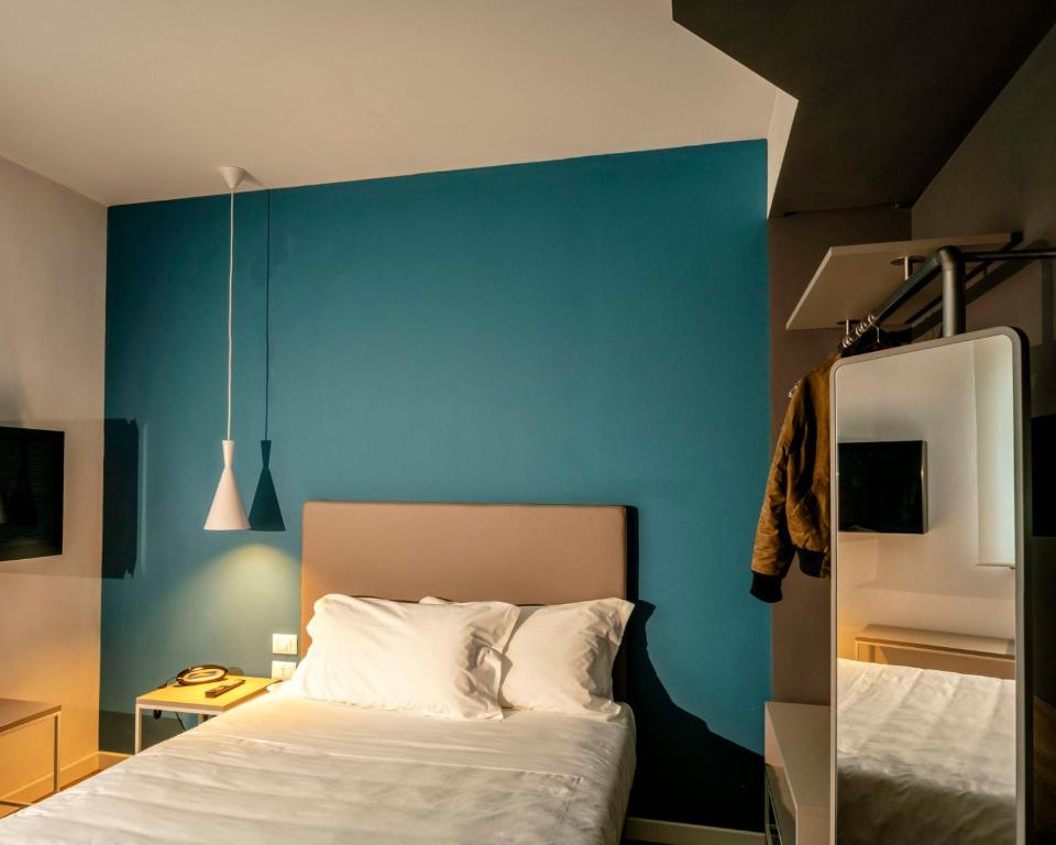 Postel nebo postele na pokoji v ubytování Best Western Hotel Corsi