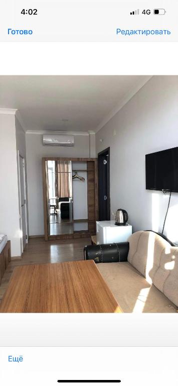 TV a/nebo společenská místnost v ubytování Cozy Rooms