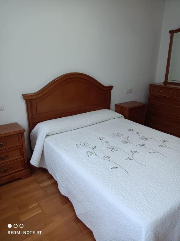 Postel nebo postele na pokoji v ubytování apartamento de dos habitaciones en Quiroga