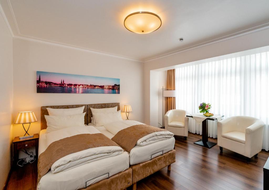 Postel nebo postele na pokoji v ubytování Hotel von Stephan