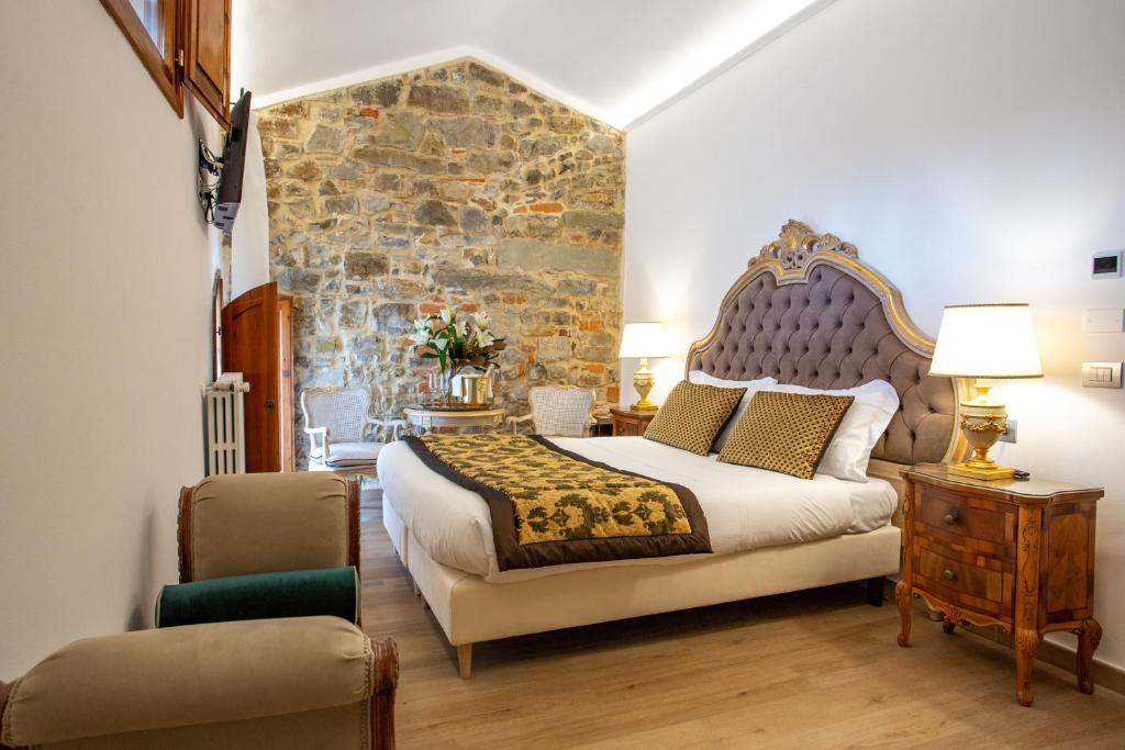 A bed or beds in a room at Residenza le Colline del Paradiso