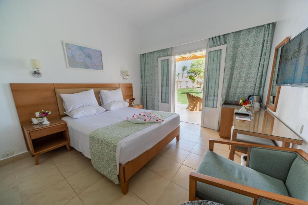 Postel nebo postele na pokoji v ubytování Dahab Lagoon Club & Resort Ex Tirana Dahab