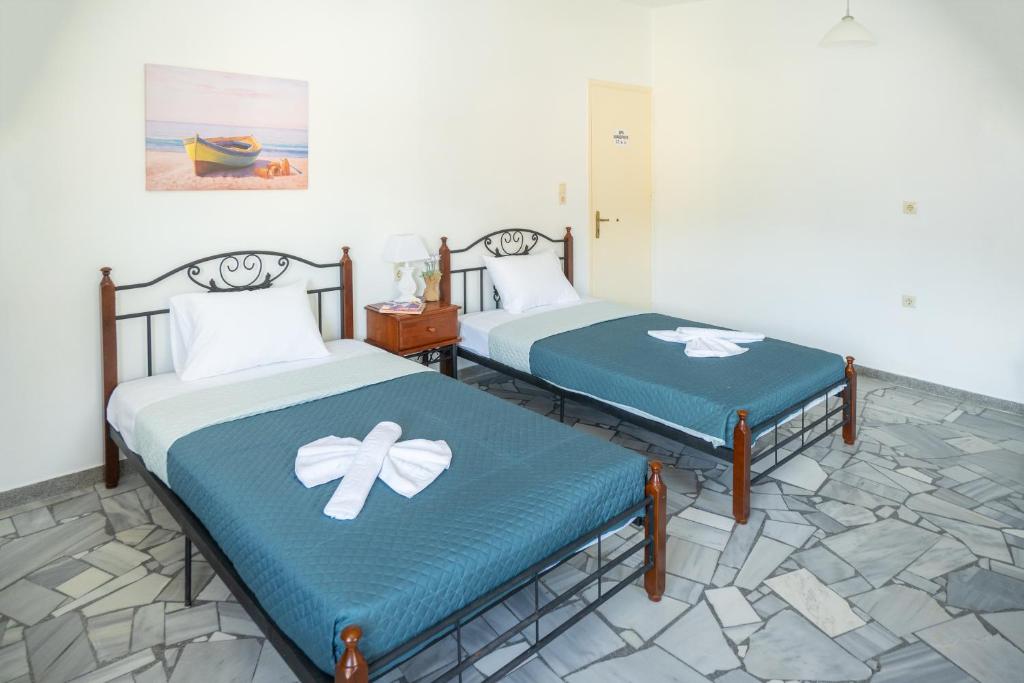 Postel nebo postele na pokoji v ubytování Almy Beach Hotel