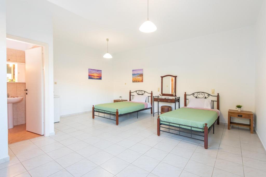 Postel nebo postele na pokoji v ubytování Almy Beach Hotel