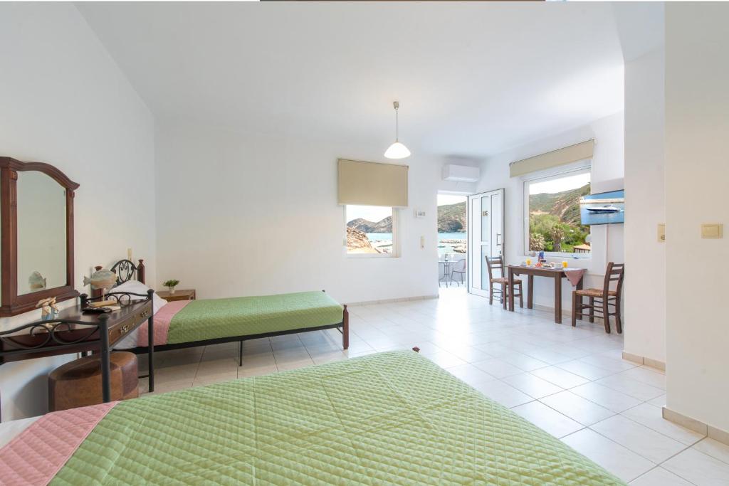 Postel nebo postele na pokoji v ubytování Almy Beach Hotel