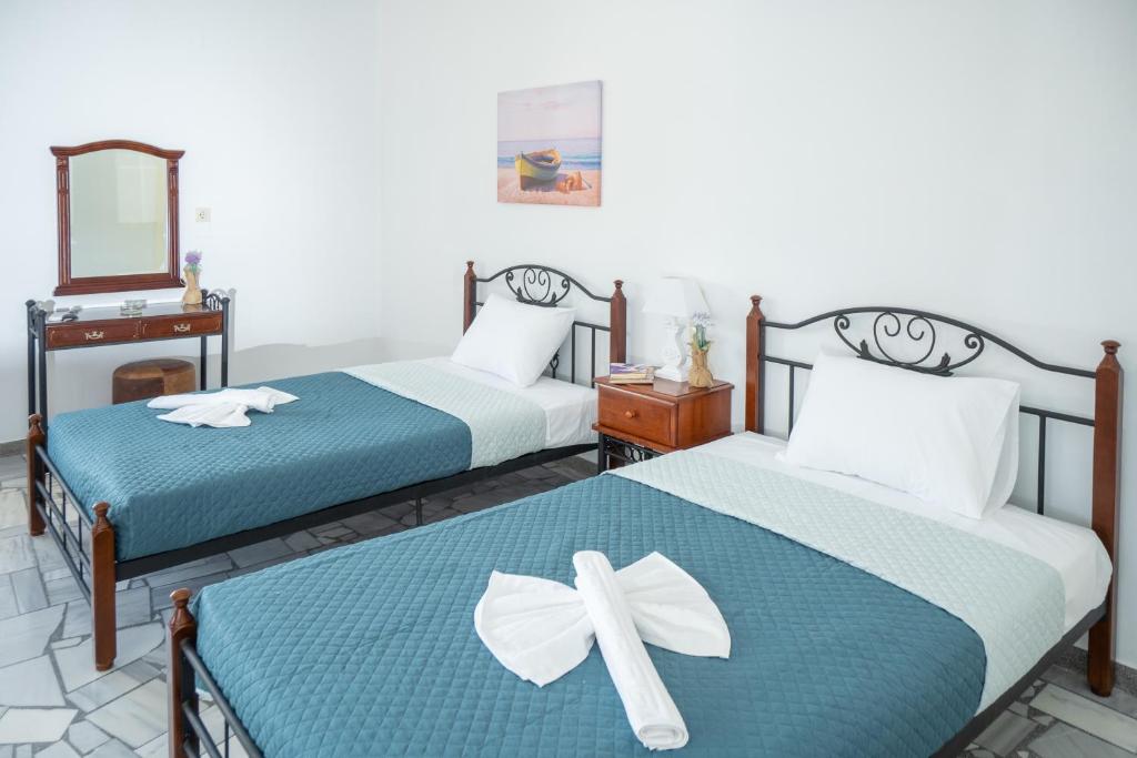 Postel nebo postele na pokoji v ubytování Almy Beach Hotel