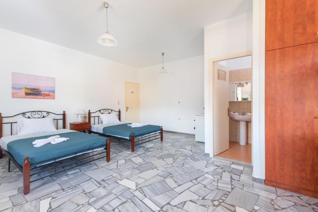 Postel nebo postele na pokoji v ubytování Almy Beach Hotel