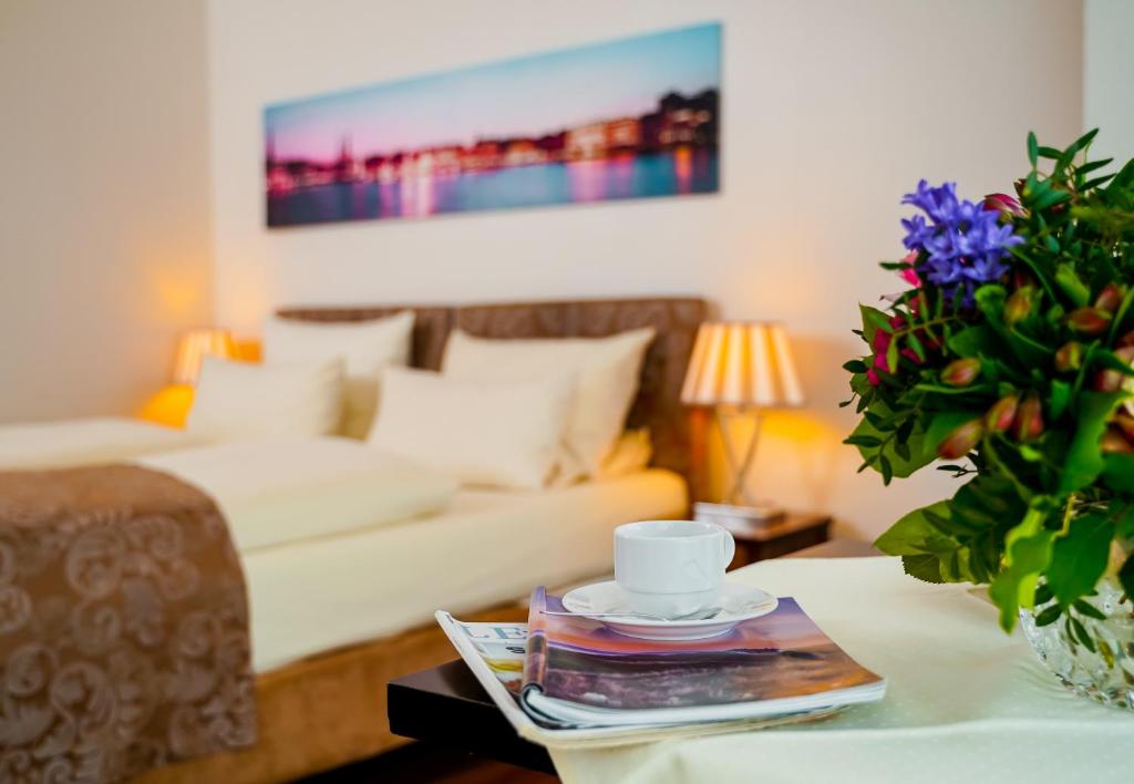 Postel nebo postele na pokoji v ubytování Hotel von Stephan