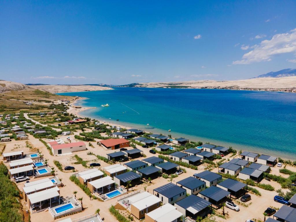 an aerial view of a resort next to a body of water at Terra Park SpiritoS in Kolan