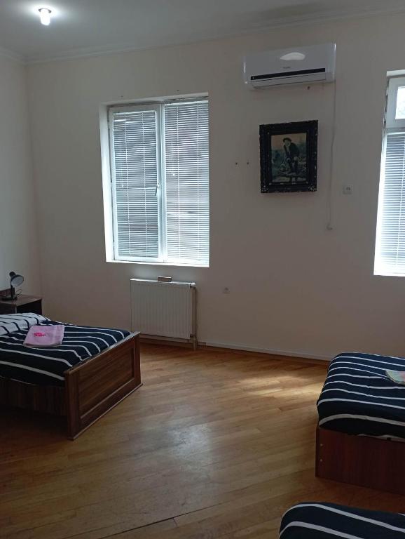Postel nebo postele na pokoji v ubytování Art House Hostel Aleksandr