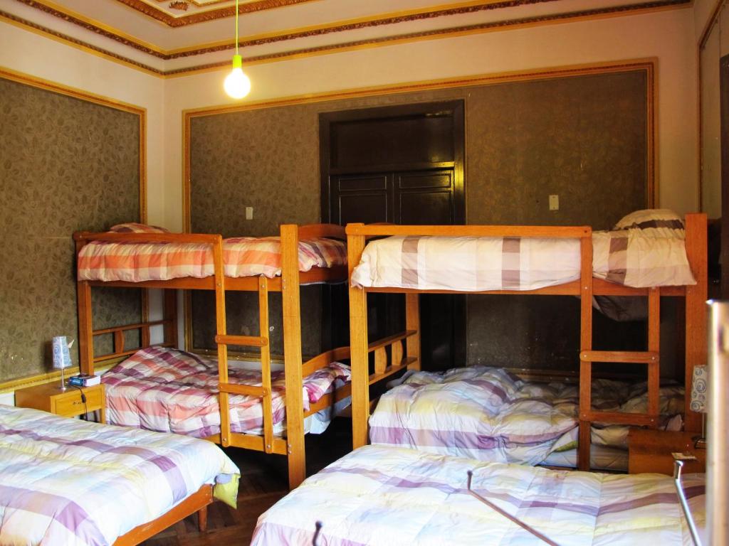 Postel nebo postele na pokoji v ubytování Park Hostel