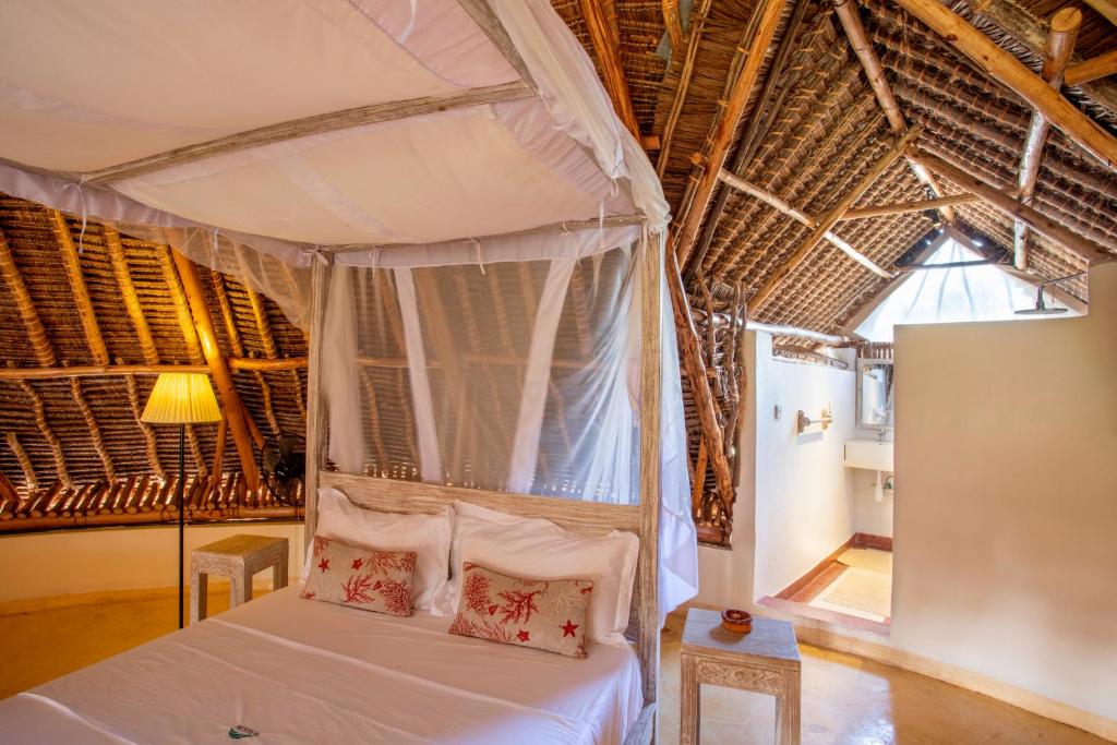 Letto o letti in una camera di Aestus Villas Resort