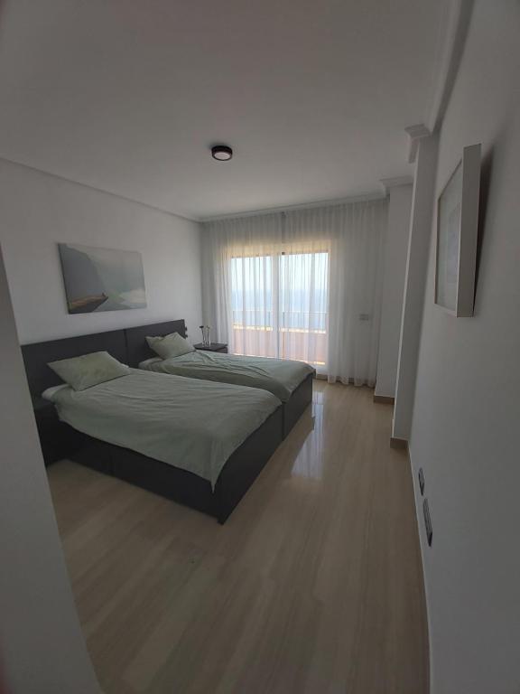 Postel nebo postele na pokoji v ubytování Casa Don Marco