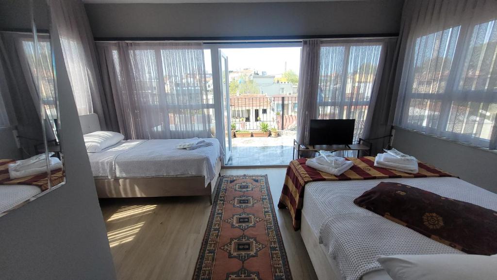 Postel nebo postele na pokoji v ubytování MEHMET BEY HOTEL