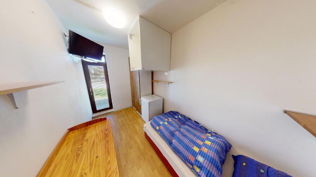 Postel nebo postele na pokoji v ubytování U MIRASE Heřmaničky