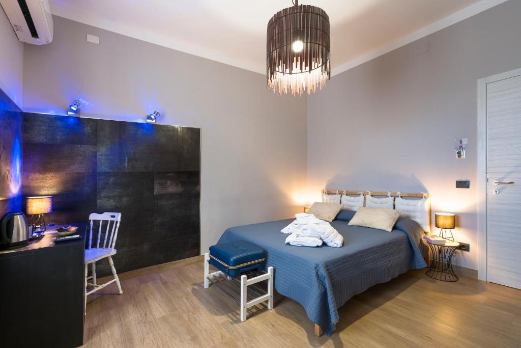 Posteľ alebo postele v izbe v ubytovaní Il Tempio di Athena - Cultura e Relax a Siracusa