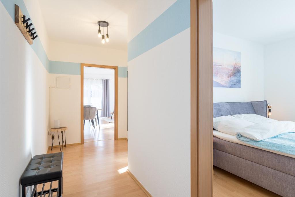 Postel nebo postele na pokoji v ubytování Harmony: Edersee Apartment – Sperrmauer – Lounge