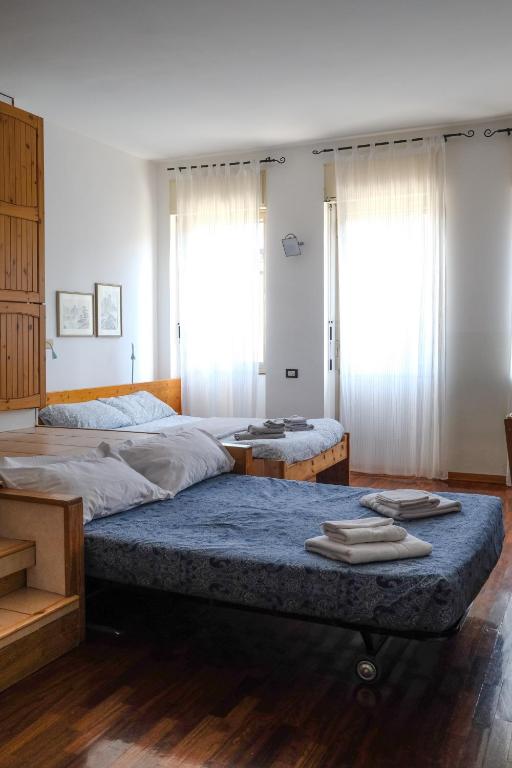 Posteľ alebo postele v izbe v ubytovaní Casa Giuly