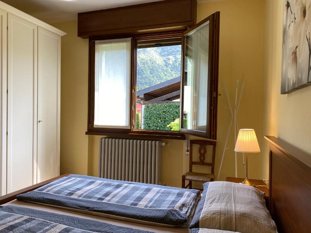 Postel nebo postele na pokoji v ubytování Casa Michela