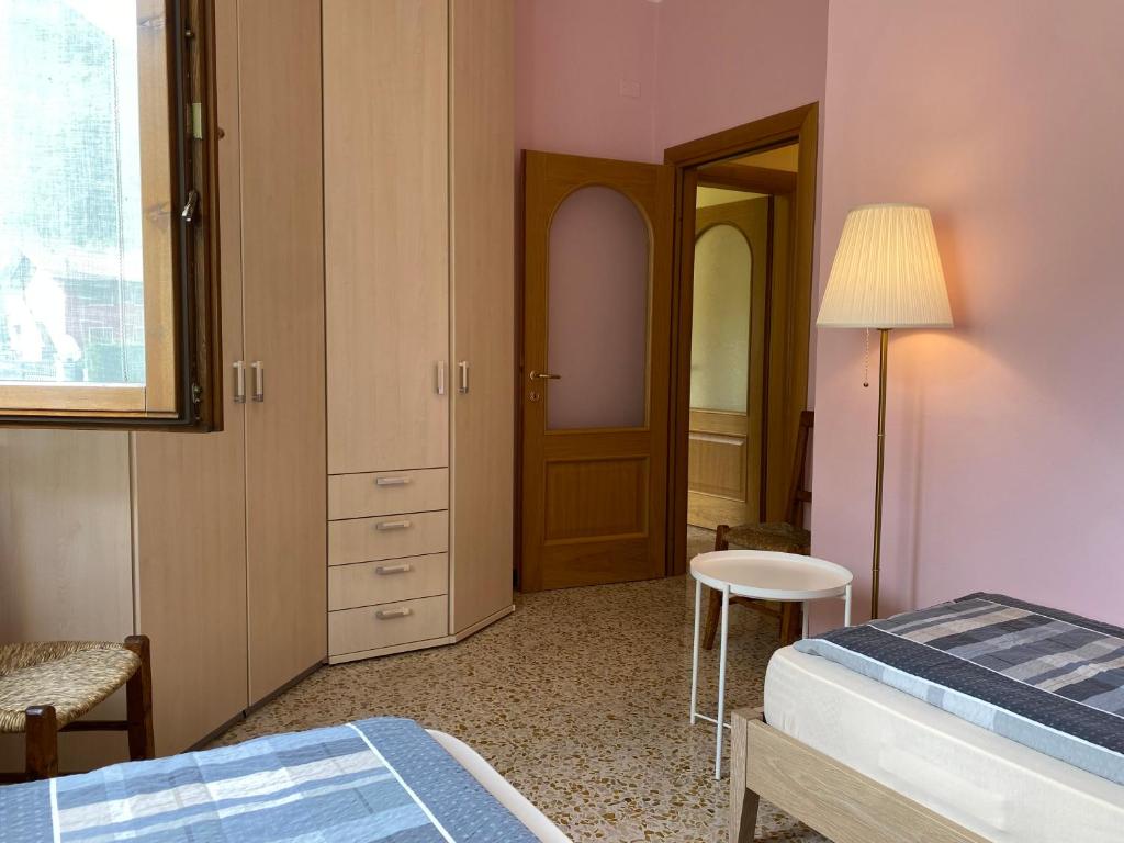 Postel nebo postele na pokoji v ubytování Casa Michela