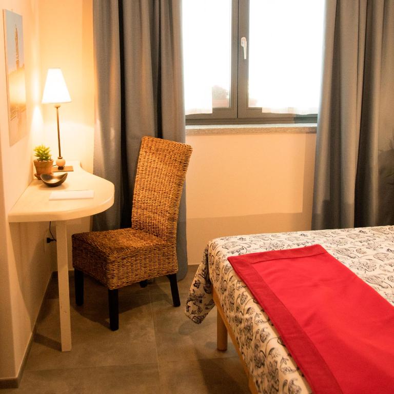 Postel nebo postele na pokoji v ubytování B&B Belelì Daramba