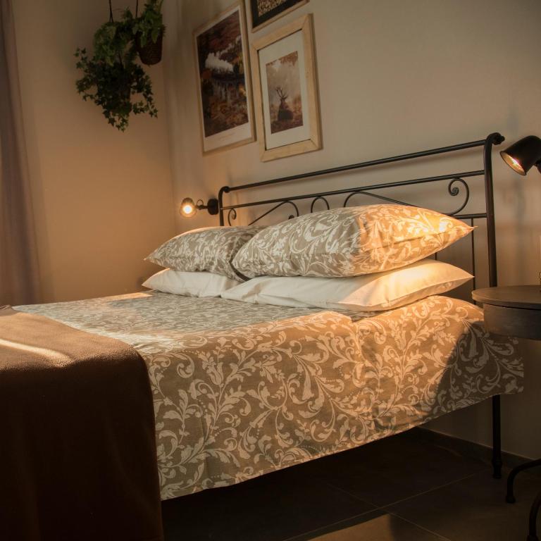 Postel nebo postele na pokoji v ubytování B&B Belelì Daramba