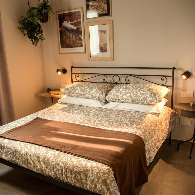 Postel nebo postele na pokoji v ubytování B&B Belelì Daramba