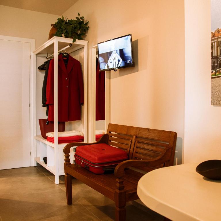 TV a/nebo společenská místnost v ubytování B&B Belelì Daramba