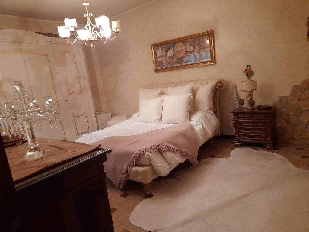 Postel nebo postele na pokoji v ubytování La Casa delle Stelle