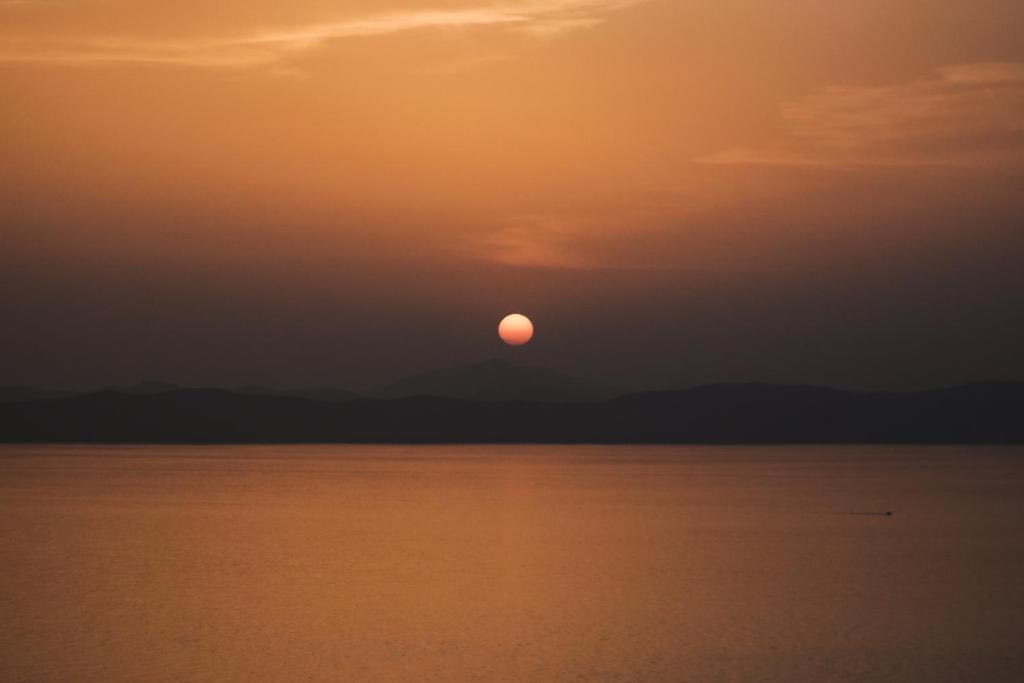 The sunrise or sunset as seen from A villát or nearby
