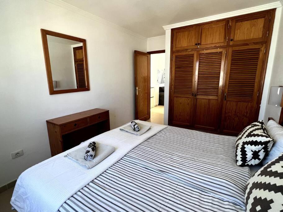 Posteľ alebo postele v izbe v ubytovaní Casa Iris - central apartment with panoramic views
