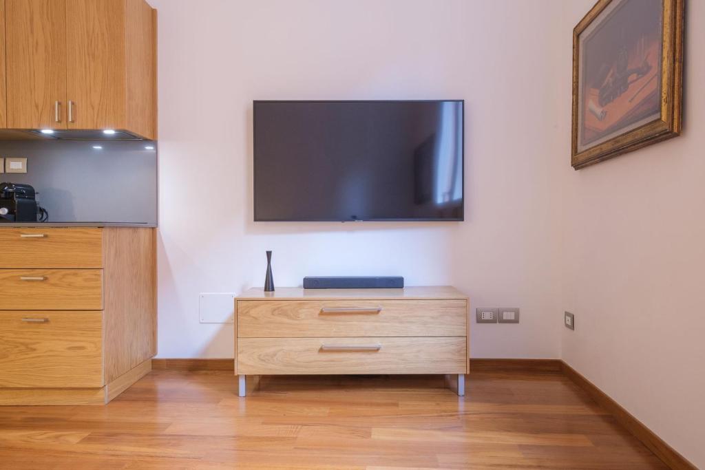 Televízia a/alebo spoločenská miestnosť v ubytovaní D'Azeglio & Galluzzi Suites