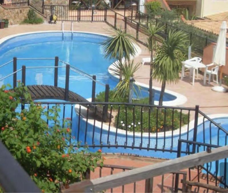 The swimming pool at or close to Dimora Pintau in residence con piscina privata