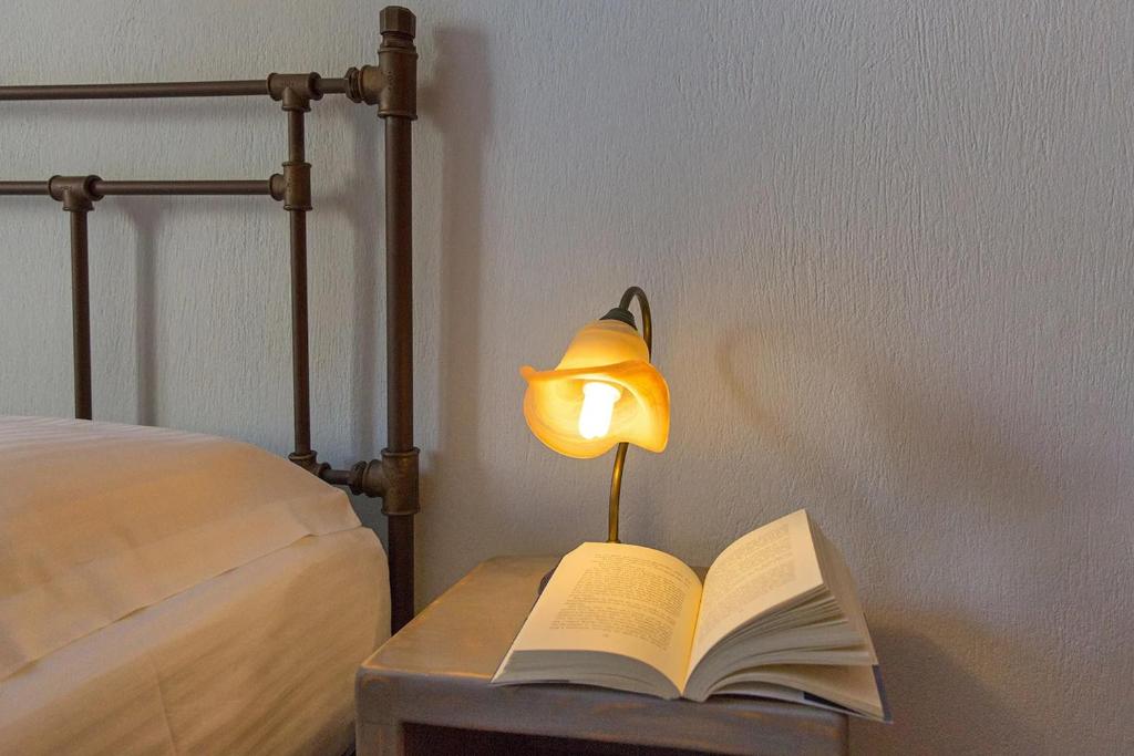 A bed or beds in a room at SAIL VILLA
