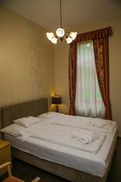 Posteľ alebo postele v izbe v ubytovaní Főnix Wellness Resort