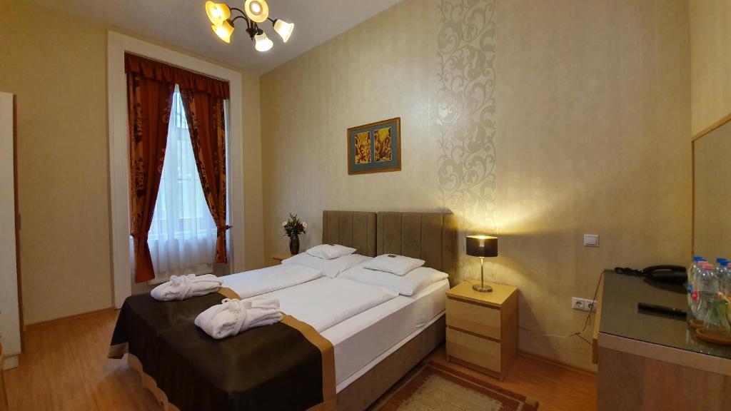 Posteľ alebo postele v izbe v ubytovaní Főnix Wellness Resort