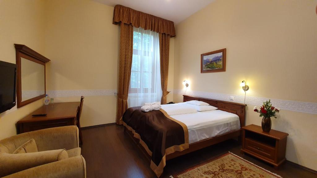 Posteľ alebo postele v izbe v ubytovaní Főnix Wellness Resort