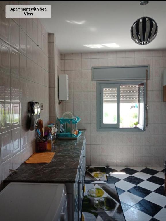 Kuchyň nebo kuchyňský kout v ubytování Martil Center Apartments