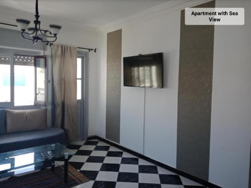 TV a/nebo společenská místnost v ubytování Martil Center Apartments